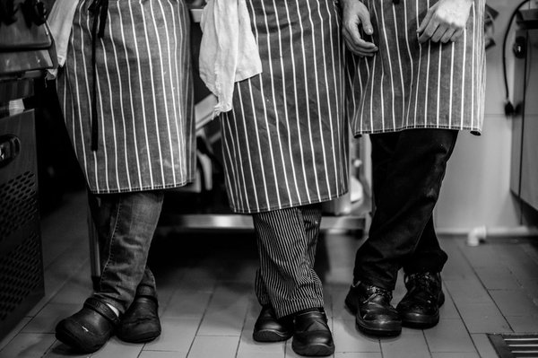 What's the Ideal Way to Style a Pinstripe Vest with Office Attire for a Sleek Look?